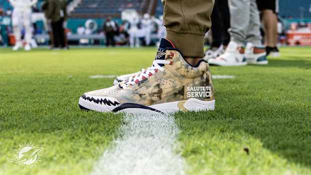 View of camo Nike shoes.